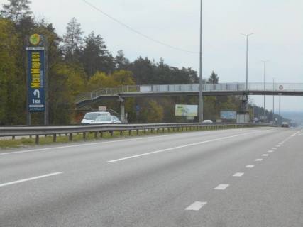 Билборд B в Капітанівке, 6х3  с. Капітанівка, траса М-06 "Київ-Чоп" (Житомир), км 24+100 право, поворот на Бучу, автобусна зупинка Капітанівка, через 720м після АЗС AMIC фото 1