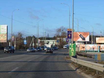 Билборд A в Ирпене м. Ірпінь, траса М-07, км 23+450 право, після офісу ЖК "Гостомель Різіденс", 125м до АЗС ОККО, 300м до розвилки  Ірпінь-Буча-Гостомель фото 1
