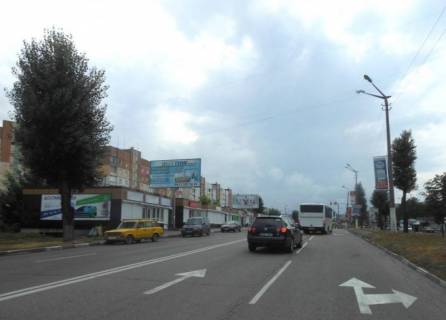 Билборд B в Обухове м. Обухів, вул. Київська,168, навпроти ринку та житлового комплексу "Нектарний"; перед поворотом до супермаркета "Велика кишеня" фото 1