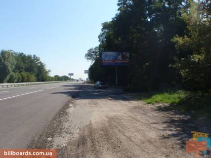 Билборд A в Миле, 6х3  с. Мила, траса М-06 "Київ-Чоп" (Житомир), км 27+900 ліво, за 500м до АЗС GLUSCO та UPG фото 1