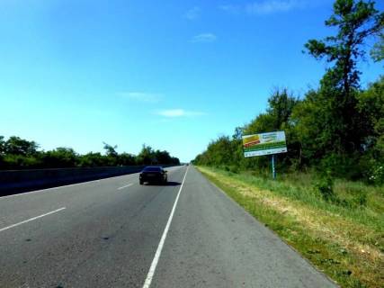 Білборд A у с. Ксаверівка, 6х3  с. Ксаверівка, траса М-05 Київ-Одеса, км 58 + 270 право, за 1150м до повороту на с. Пінчукі та с. Ксаверівка 2-га Фото 1