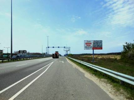 Билборд A в Миле, 6х3  с. Мила, траса М-06 "Київ-Чоп" (Житомир), км 26+700 право, за 650м перед  АЗС GLUSCO, навпроти ресторану "Два бобра" фото 1