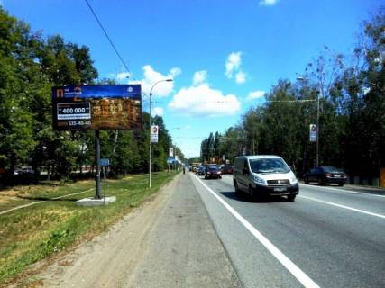 Billboard B in Bucha, 6х3  m. Buca, trasa M-07 "Kiiv-Kovel'", km 29+000 pravo, st. Nove Sose, 16, v napramku do Novusu, EKO Marketu Photo 1