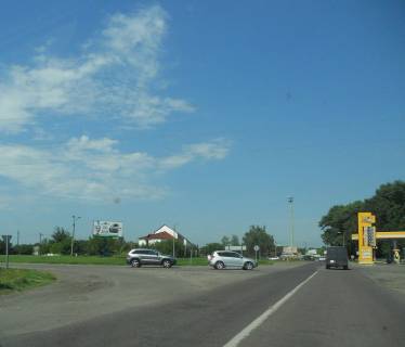 Билборд A в Переяслав (Переяслав-Хмельницкий), 6х3  Черкаська траса, траса Н-08 "Бориспіль-Дніпро-Запоріжжя", км 43+900 кільце, КПП ДАІ м. Переяслав-Хмельницький, в'їзд в м. Переяслав-Хмельницький, АЗС "БРСМ" фото 1