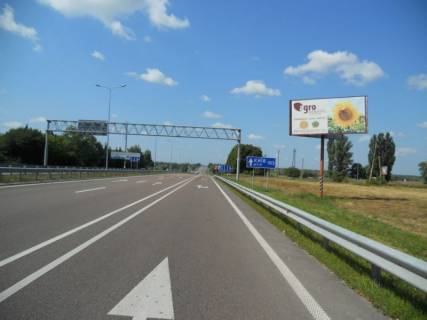 Билборд A на трассах Киевской области, 6х3  Харківська траса, траса М-03 "Київ-Харків", км 44+050 ліво, через 600м після розв'язки з автошляхом Р03 та АЗС Brent Oil, через 900м після АЗС UPG, через 1.1км після автобусної зупинки та АЗС ОККО фото 1