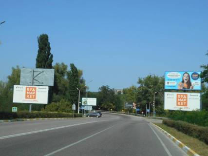Билборд A в Обухове, 6х3  м. Обухів, вул. Київська, 168-К, заїзд до АТБ, в напрямку Києва, Українки, верх фото 1