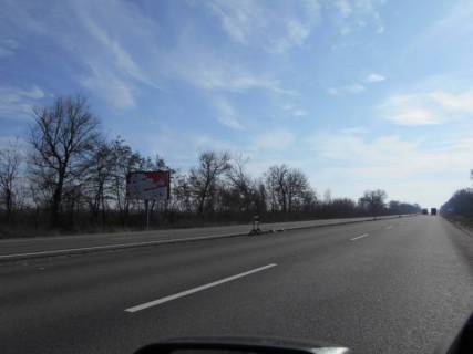 Білборд, Бігборд (Борд)  B у Києві траса М-05 Київ-Одеса, км 74+840 ліво, через 920м після повороту на с. Глушки Фото 1