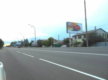 Billboard A in Brovary, 6х3  m. Brovari, st. Kiivs'ka, 19, za 220m do magazinu "Fora", za 240m do perehresta z st. Esenina, za 320m do AZS "KLO", cerez 30m pisla avtobusnoi zupinki, cerez 70m pisla perehrestam z st. Evgenia Zelens'kogo Photo 1
