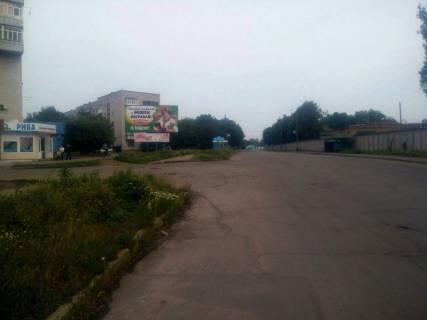 Білборд, Бігборд (Борд)  B у Умані, 6х3  м. Умань, вул. Залізнична, біля ПриватБанку, навпроти автобусної зупинки, за 320м до повороту на вул. Незалежності, через 175м после повороту на провулок Їжакевіча та 250м после качана вул. енергетична Фото 1