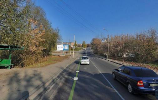 Билборд B в Умане, 6х3  м. Умань, вул. Незалежності, навпроти будинку 49, за 50м до повороту на вул. Осташівська, через 85м після автобусної зупинки та 195м після повороту на вул. Івана Богуна, правий фото 1