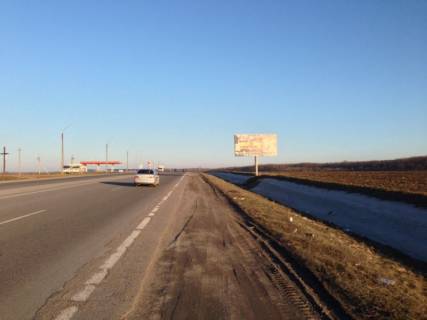 Billboard A in Uman, 6х3  trasa M-12 (Strij-Ternopil'-Vinnica-Kirovograd-Znam'anka), km 212+905 pravo, cerez 400m pisla rozv'azki z trasou Kiiv-Odesa Photo 1