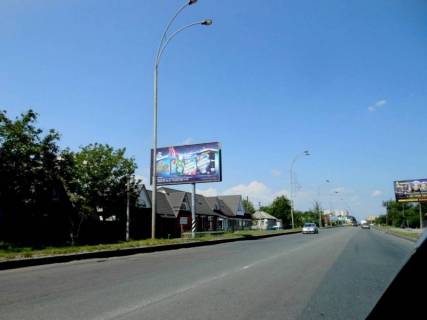 Билборд B в Бровары, 6х3  м. Бровари, вул. Київська, 171, через 120м після повороту на вул. Лисенка, через 100м після магазину "АТБ", за 35м до повороту на Костомарова Миколи вул. (кол. Гальбича) фото 1