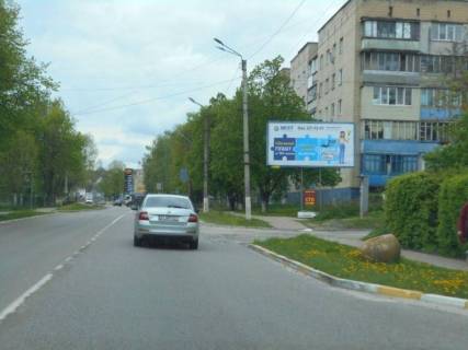 Білборд, Бігборд (Борд)  A у Обухові, 6х3  м. Обухів, вул. Київська, 31, поворот на вул. Зелений Гай, навпроти Обухівської дитячої школи мистецтв Фото 1
