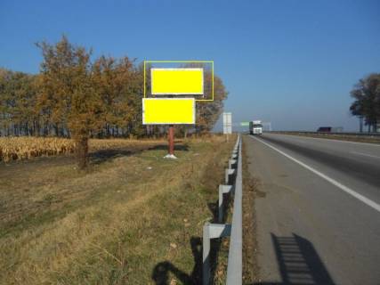 Білборд, Бігборд (Борд)  B у Умані, 6х3  траса М-05 Київ-Одеса, км 204 + 800 право, виїзд з м. Умань, верх Фото 1
