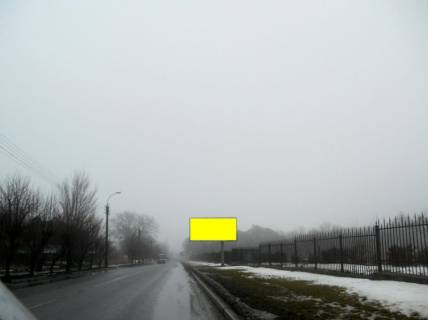 Billboard A in Uman, 6х3  m. Uman', st. Internacional'na, navproti budinku 49, za 230m do avtobusnoi zupinki ta povorotu na st. Instituts'ka, cerez 545m pisla rozv'azki z st. Komarova ta st. Kiivs'ka Photo 1