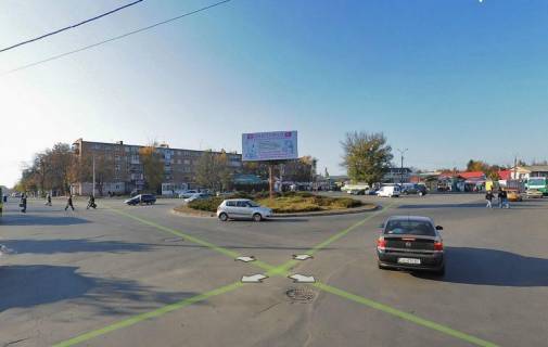 Білборд, Бігборд (Борд)  C у Умані, 6х3  м. Умань, розв'язка з вул. Київська, вул. Тищика та вул. Шевченка (клумба), біля Автовокзалу, навпроти магазину АТБ, через 200м после АЗС SOCAR Фото 1