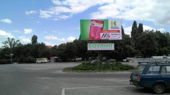 Билборд B в Умане, 6х3  м. Умань, розв'язка з вул. Івана Гонти та вул. Незалежності, за 60м до автобусної зупинки, через 75м після ПриватБанку (по вул. Незалежності), за 100м до магазину АТБ та повороту на вул. Мазепи (по вул. Івана Гонти) фото 1