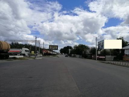 Билборд A в Калиновке, 6х3  смт. Калинівка, перехрестя вул. Залізнична та автошляху Т-1038, навпроти автобусної зупинки, біля АЗС МОТТО, через 100м після повороту на пров. Український, за 500м до АЗС MARSEL фото 1