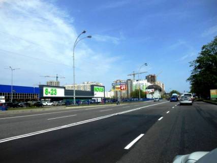 Билборд B в Бровары, 6х3   м. Бровари, вул. Київська, навпроти будинку 310, біля магазину "Епіцентр" та магазину "Novus", через 50м після автобусної зупинки, через 255м після повороту на вул. Козацька, через 500м після повороту до ЖК "Лісовий квартал", за 100м до повороту на фото 1