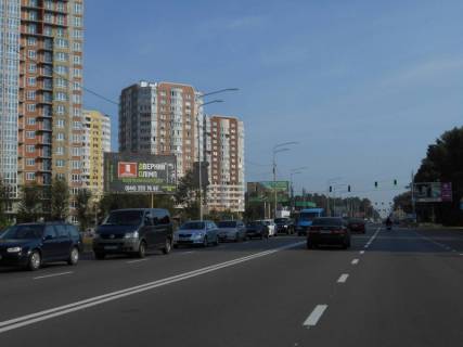 Билборд B в Бровары м. Бровари, вул. Київська, 261, через 35м після заїзду на ринок та магазину Varus, за 50м до магазину АТБ, за 130м до АЗС WOG та 150м до повороту на вул. Василя Стефаника фото 1