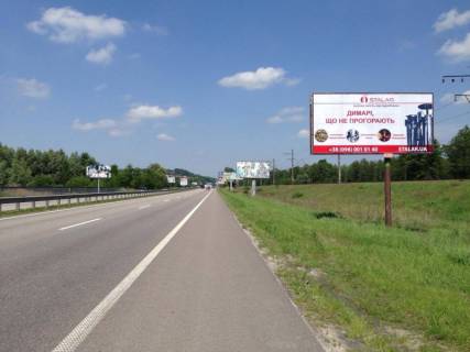 Білборд A у Києві шосе Дніпровське (шосе Дніпропетровське), траса Н-01 "Київ-Знам'янка", км 21+890 ліво, за 1,1км до повороту на с. Лісники, навпроти - територія під котеджну забудову Фото 1