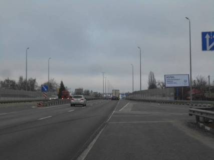 Billboard A in Lyubimivka, 6х3  s. Lubimivka, trasa M-06 "Kiiv-Cop" (Zitomir), km 33+500 livo, sadovij centr "Lizgard", za 450m do povorotu na s. Buca Photo 1