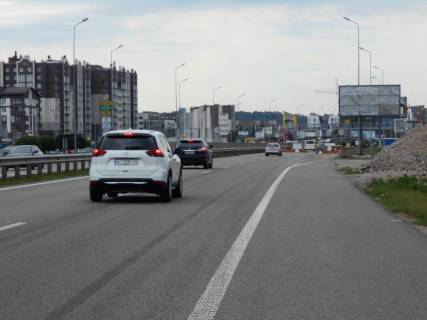 Білборд, Бігборд (Борд)  A у Ходосівці, 6х3  Дніпровське шосе, траса Н-01 "Київ-Знам'янка", км 23+850 ліво, за 200м до повороту на с. Ходосівку та АЗС UPG, навпроти ТЦ "МегаМаркет" Фото 1