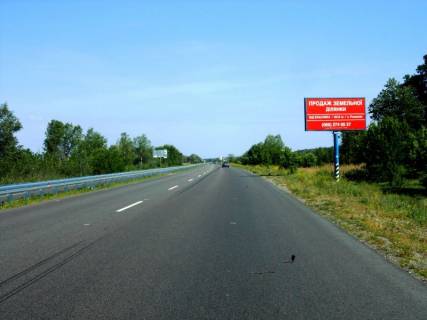 Білборд, Бігборд (Борд)  A на трасах Київської області, 6х3  Дніпровське шосе, траса Н-01 "Київ-Знам'янка", км 30+970 ліво, за 2,2км до ресторану "Край-Рай", елітна приватна забудова, біля с. Великі Дмитровичі Фото 1
