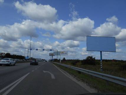 Билборд A в Миле с. Мила, траса М-06 Київ-Чоп (Житомир), км 26+700 право, за 650м перед  АЗС GLUSCO, навпроти ресторан "Два бобра" фото 1
