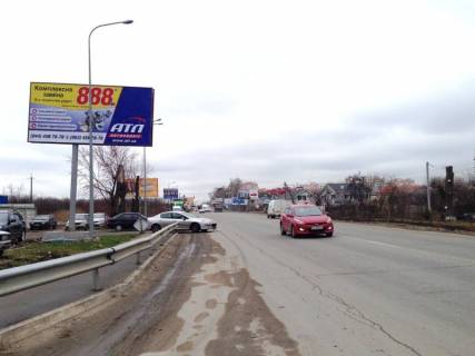 Билборд B в Киеве с. Святопетрівське, траса Р-04 "Київ-Бишів-Звенигородка", вул. Білогородська, 14, через 600м після складу "Санта Бремор", за 140м до повороту на вул. Центральна фото 1