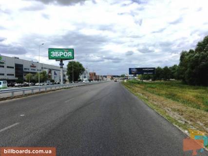 Билборд A в Ходосовке, 12х3  Дніпровське шосе, траса Н-01 "Київ-Знам'янка", км 23+950 ліво, за 300м до повороту на с. Ходосівку та АЗС UPG, навпроти ТЦ "МегаМаркет", лівий фото 1