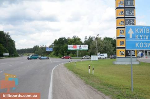 Билборд A в Киеве, 12х3  шосе Дніпровське (шосе Дніпропетровське), траса Н-01 "Київ-Знам'янка", км 39+000 ліво, на розвилці доріг Н-01 "Київ-Знам'янка" та Р-01 "Київ-Обухів", навпроти АЗС, лівий фото 1
