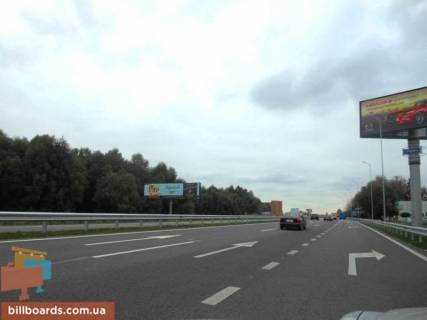 Billboard B in Khodosivka, 12х3  Dniprovs'ke sose, trasa N-01 "Kiiv-Znam'anka", km 23+950 livo, cerez 300m pisla povorotu na s. Hodosivku ta AZS UPG, navproti TC "MegaMarket", livij Photo 1