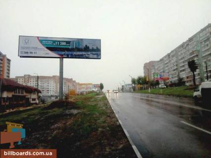 Білборд, Бігборд (Борд)  B у Обухові, 12х3  м. Обухів, вул. Київська, 166-К, за 50м до ринку "Піщаний", біля житлового комплексу "Нектарний", правий Фото 1