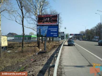 Білборд, Бігборд (Борд)  B у Києві м. Київ, проспект Академіка Глушкова, траса М-05 Київ-Одеса, км 13+650 право, біля АЗС UPG, через 60м після АЗС ОККО, через 220м після Нової Лінії та магазину АТБ, низ Фото 1