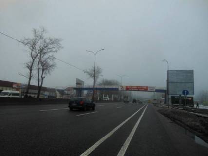 Билборд A в Киеве, 6х6  м. Київ, проспект Академіка Глушкова, траса М-05 Київ-Одеса, км 13+930 ліво, навпроти магазину АТБ, виїзд з Нової Лінії, за 130м до АЗС ОККО, низ фото 1
