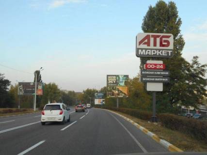Билборд A в Обухове, 6х3  м. Обухів, вул. Київська, 168, виїзд з м. Обухів в м. Київ, Українку, через 200м після ринку "Піщаний", верх фото 1