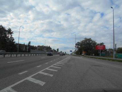 Билборд A в Миле с. Мила, траса М-06 Київ-Чоп (Житомир), км 25+280 право, через 400м після повороту на Ворзель, за 400м до повороту на Дмитрівку, біля АТБ Маркету фото 1