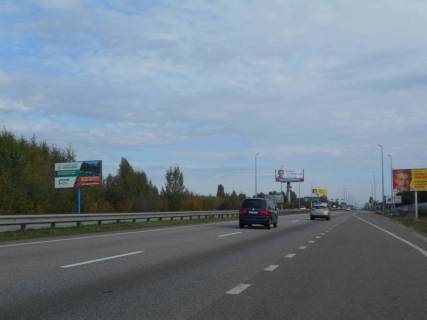 Білборд, Бігборд (Борд)  B на трасах Київської області, 6х3  с. Мила, траса М-06 "Київ-Чоп" (Житомир), км 27+100 право, за 350м до ресторану "Два бобра", через 300м після АЗС GLUSCO та UPG Фото 1