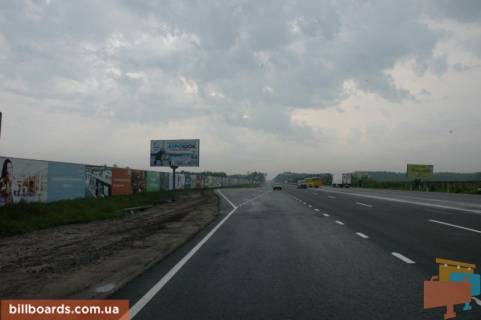 Билборд B в Миле, 6х3  с. Мила, траса М-06 "Київ-Чоп" (Житомир), км 26+950 ліво, через 150м після ресторану "Два Бобра", за 475м до АЗС GLUSCO фото 1