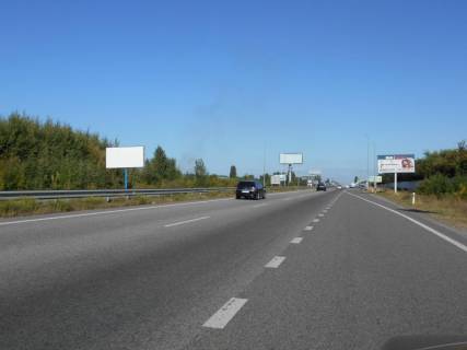 Billboard B in With. Mila s. Mila, trasa M-06 Kiiv-Cop (Zitomir), km 27+100 pravo, 350m pered restoranom "Dva bobra", 300m pisla AZS GLUSCO Photo 1