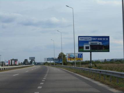 Білборд, Бігборд (Борд)  A у Ходосівці, 6х3  Дніпровське шосе, траса Н-01 "Київ-Знам'янка", км 24+100 право, через 450м після повороту на с. Ходосівку та АЗС UPG, через 100м після ТЦ "МегаМаркет", за 150м до ТЦ "Аракс" Фото 1