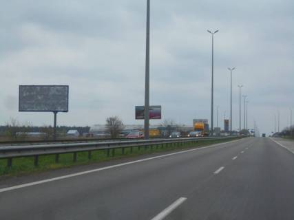 Билборд B в Мрії, 6х3  с. Мрія, траса М-06 "Київ-Чоп" (Житомир), км 30+100 право, за 450м до "Camper group" фото 1