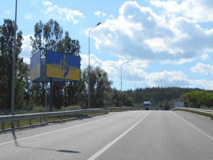 Білборд, Бігборд (Борд)  B у Обухові, 6х3  м. Обухів, початок вул. Промислова, міст через трасу Н-01 "Київ-Знам'янка", на повороті на Київ Фото 1