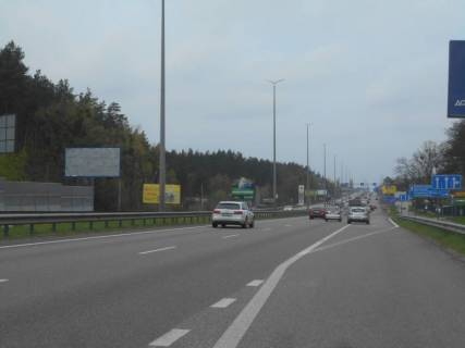 Білборд, Бігборд (Борд)  B у Капітанівке, 6х3  с. Капітанівка, траса М-06 "Київ-Чоп" (Житомир), км 24+500 ліво, за 320м до АЗС АМІС та повороту на Ворзель, за 180м до Мега Маркету Фото 1