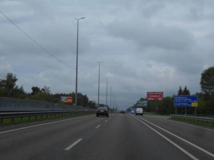 Билборд A в Капітанівке, 6х3  с. Капітанівка, траса М-06 "Київ-Чоп" (Житомир), км 24+280 право, за 540м до АЗС АМІС та повороту на Ворзель, за 400м до Мега Маркету фото 1