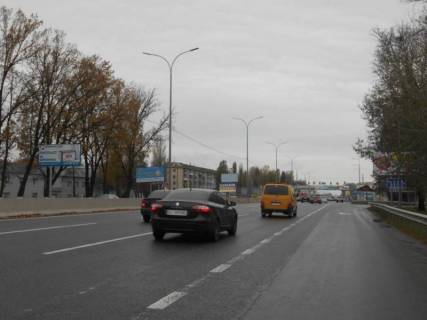 Билборд B в Чабаны с. Чабани, траса М-05 Київ-Одеса, км 14+940 ліво, через 875м після Нової Лінії та магазину АТБ, заїзд у МегаМаркет Гатне, за 70м до автобусної зупинки, за 150м до повороту на Гатне, Крюківщину, Вишневе фото 1