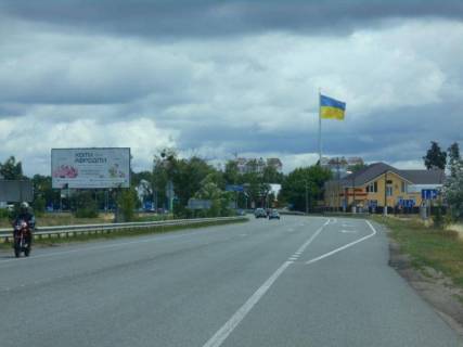 Билборд B в Ворзеле, 6х3  м. Буча, траса М-07 "Київ-Ковель", км 31+050 право, навпроти АЗС Лукойл, за 100м до повороту на смт. Ворзель фото 1