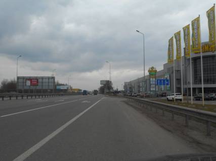 Билборд B в Киеве шосе Дніпровське (шосе Дніпропетровське), траса Н-01 "Київ-Знам'янка", км 23+750 ліво, через 100м після повороту на с. Ходосівку та АЗС UPG, навпроти ТЦ "МегаМаркет" фото 1
