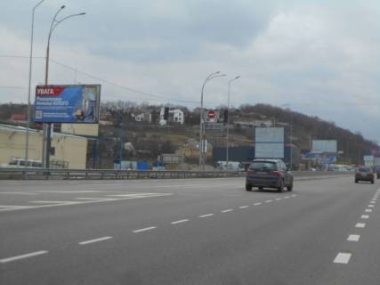 Билборд B в Лесниках (Киевской обл) Дніпровське шосе, траса Н-01 "Київ-Знам'янка", км 20+750 право, поворот на с. Лісники, магазин АТБ, ринок, низ фото 1